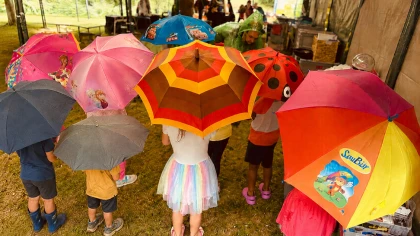 Children with umbrellas